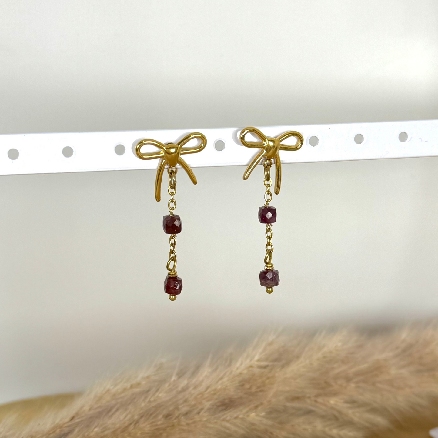 Boucles luminoeud grenat