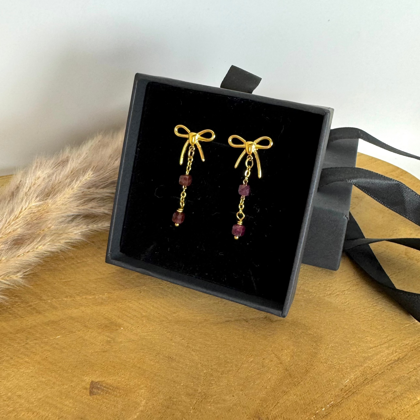 Boucles luminoeud grenat