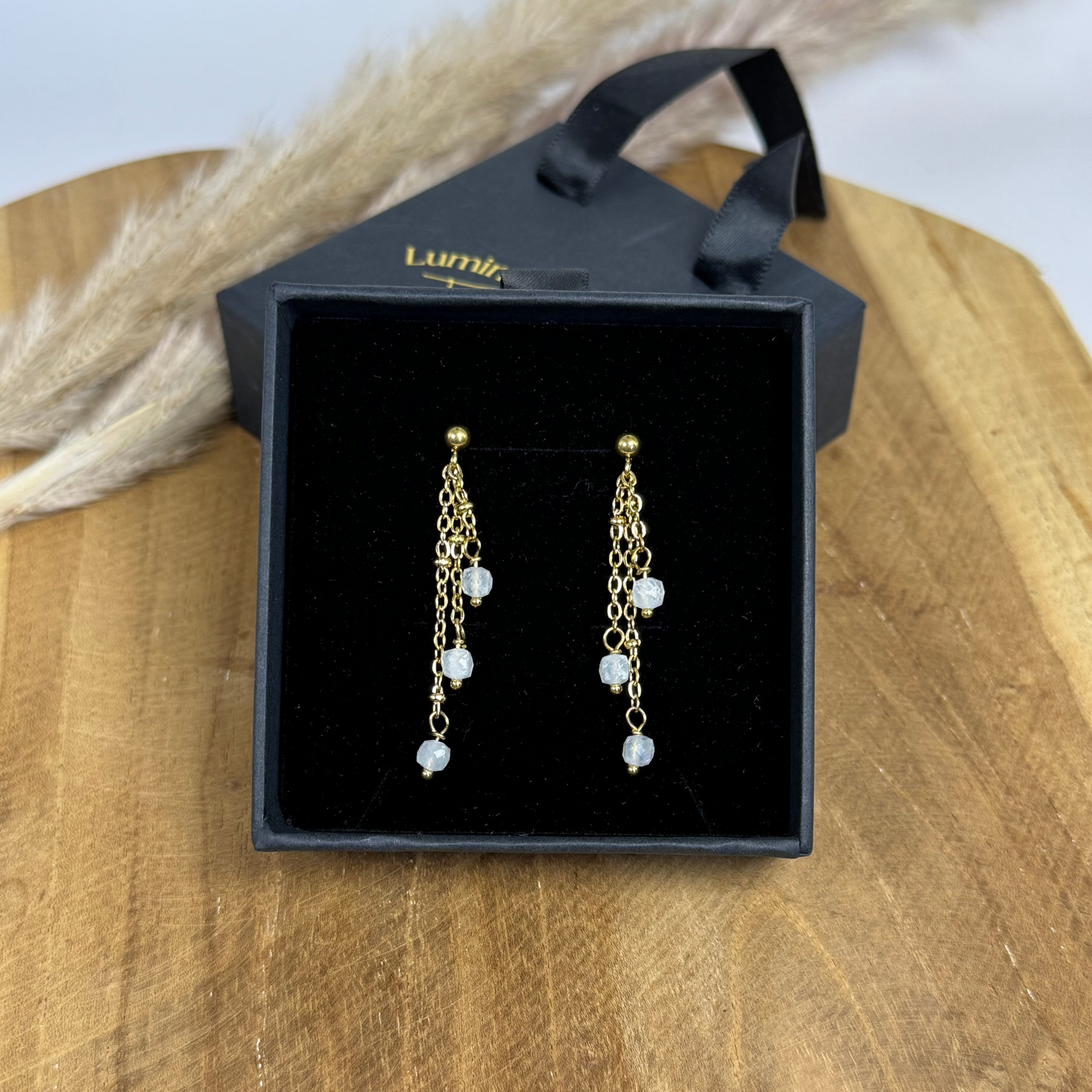 Boucles lumipluie de pierre de lune