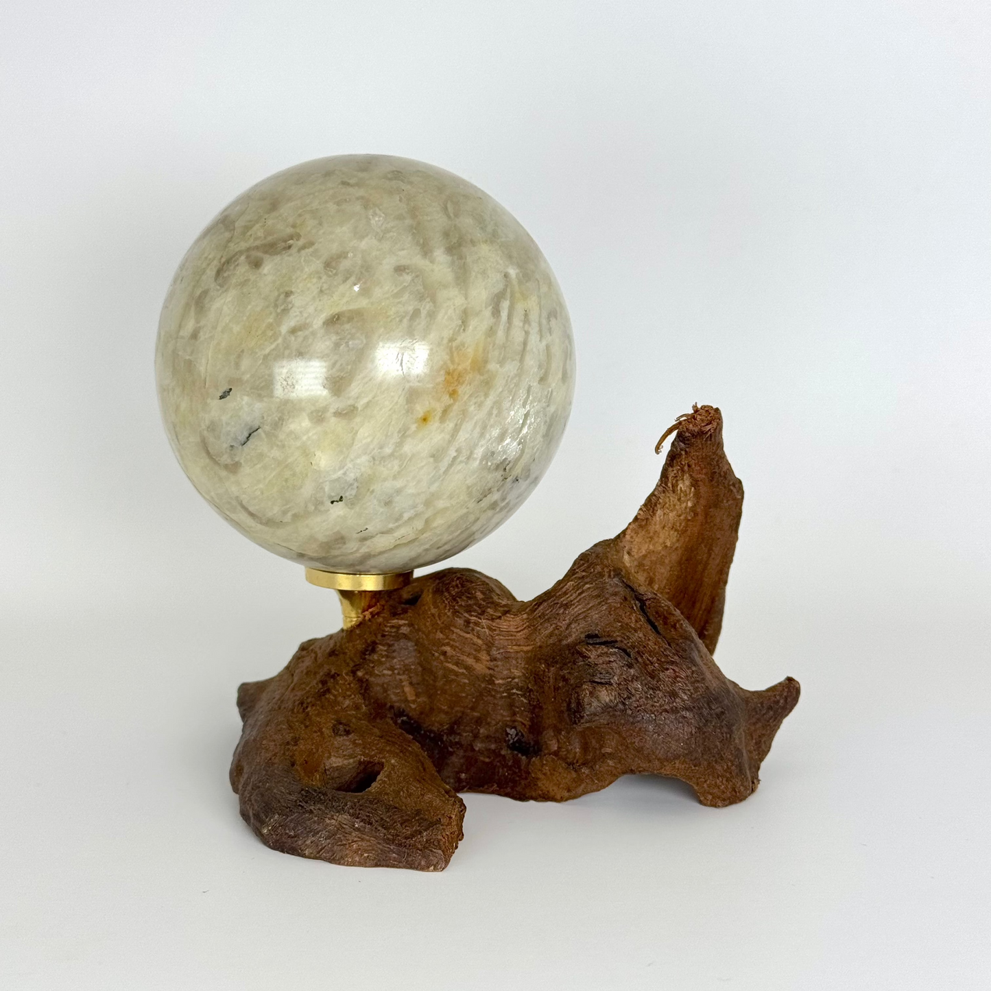 Sphère de pierre de lune inclusions de quartz fumé